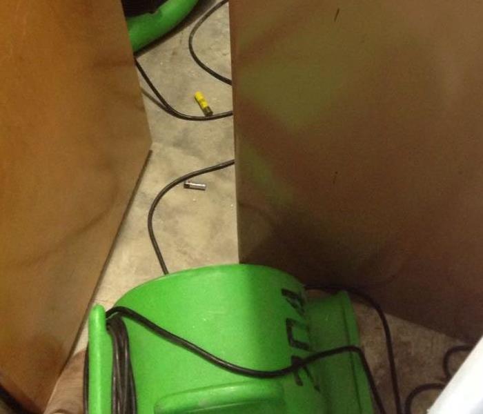 SERVPRO water damage equipment on tile floor