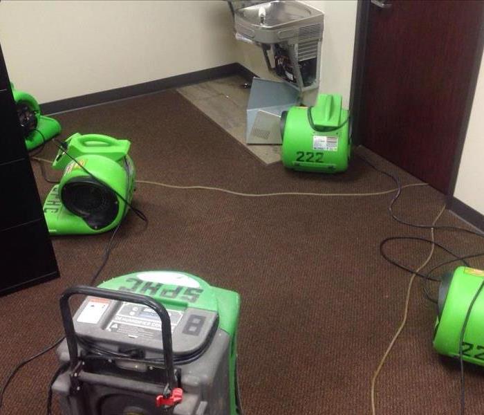 Water damage equipment set up under drinking fountain